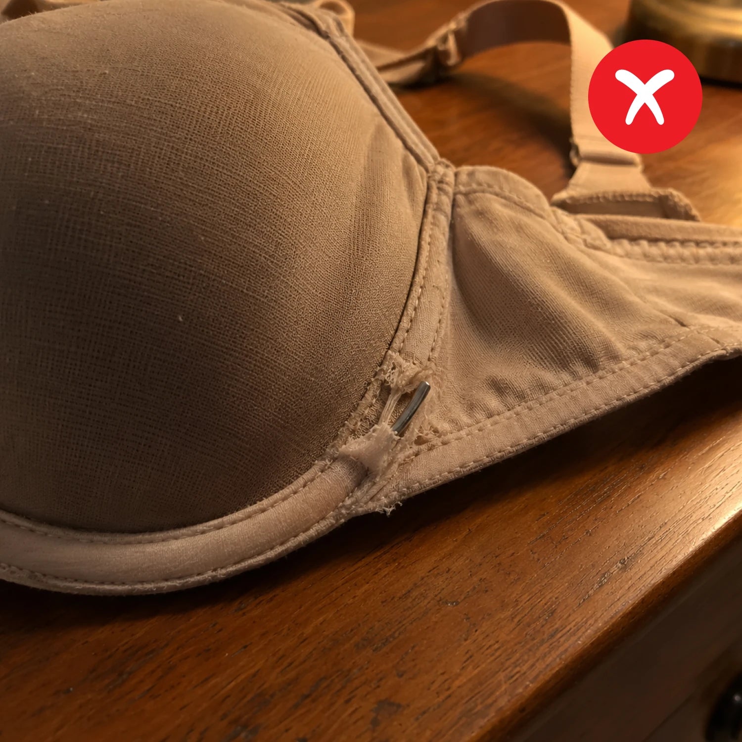 Traditional underwire bra with rigid steel hoops
