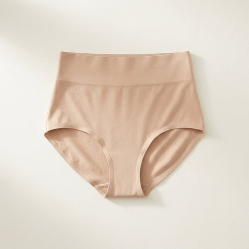 High-waisted smoothing support brief in Nude, laid flat