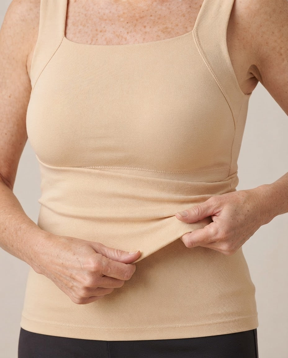 Close-up of the soft ribbed fabric and built-in support of Maggie's beige comfort tank