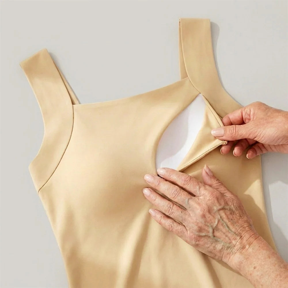 The sewn-in shelf inside the tank top, with the removable pad lifted
